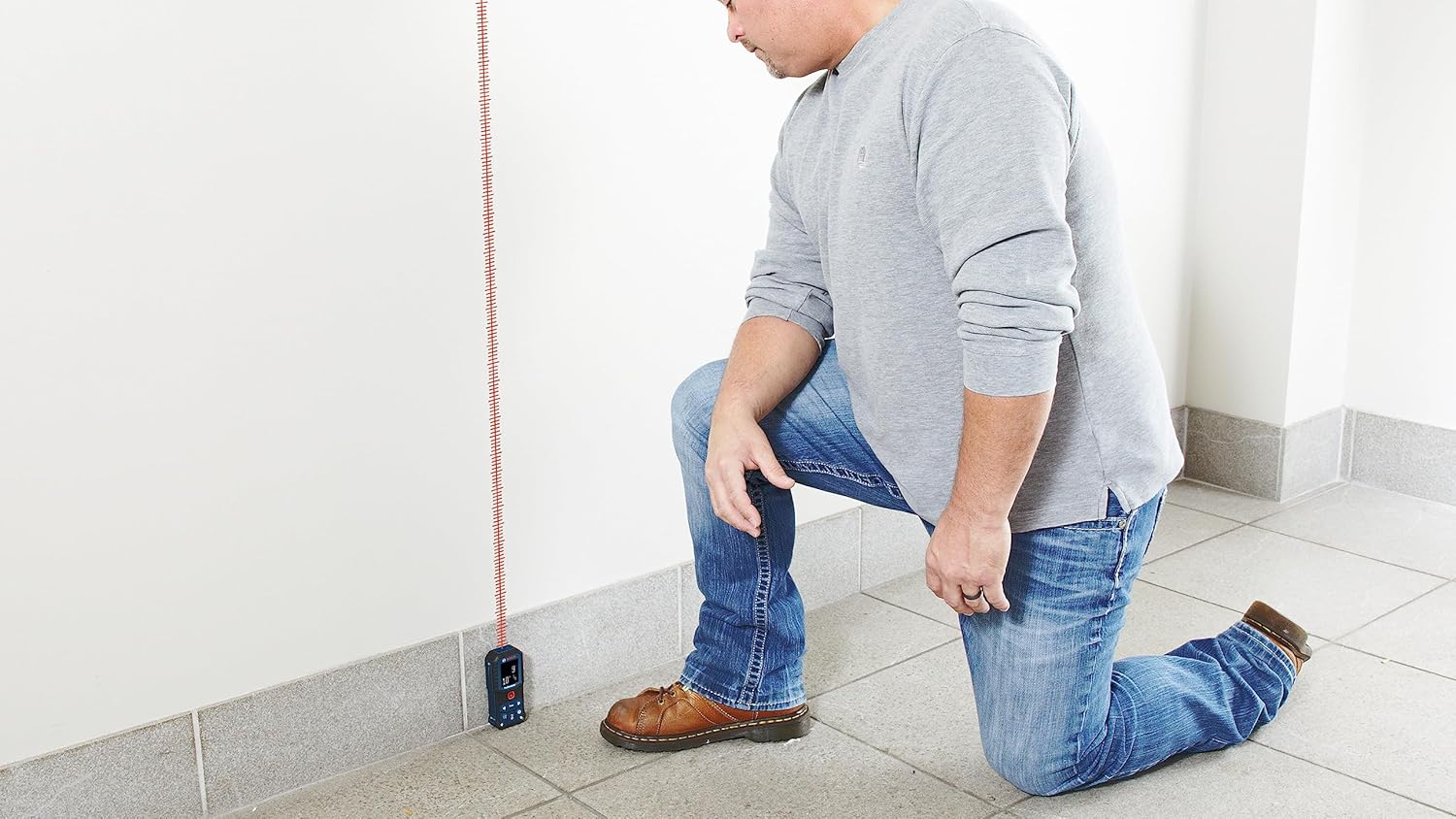 BOSCH GLM165-22 165 Ft Blaze Laser Distance Measure, Includes 2 AA Batteries, Belt Clip, & Pouch image 7